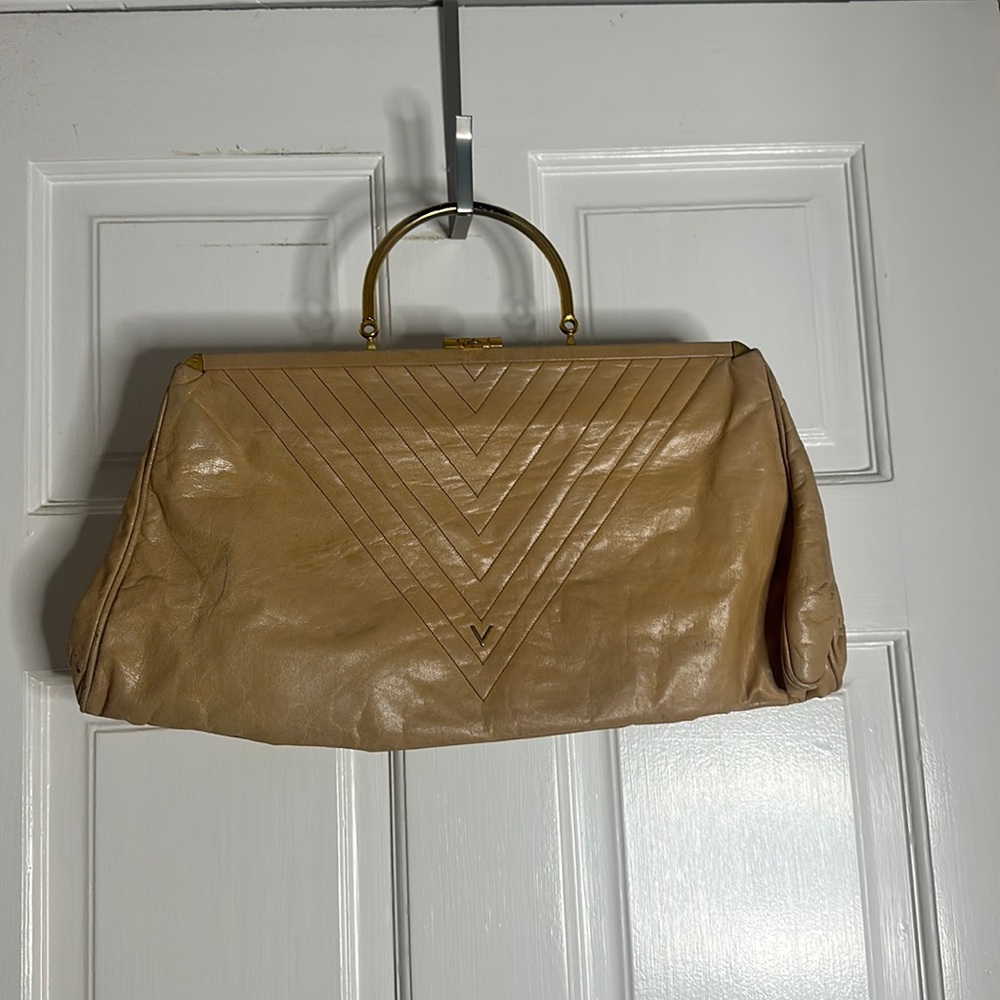 Vintage Mario Valentino cream extra large Clutch.